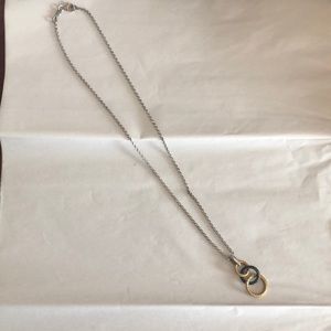 Necklace with 3 hoops.